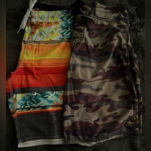 Two pair of swim trunks worn very few number of times . In like new condition .